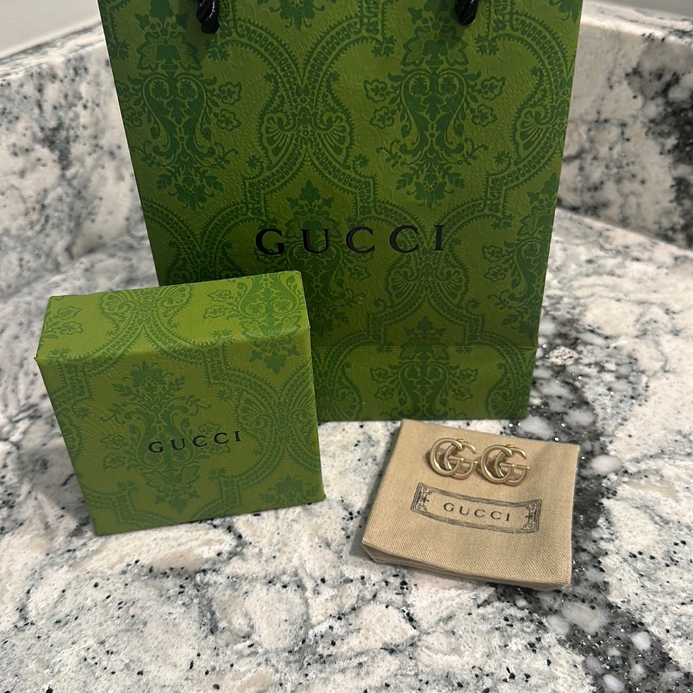 Authentic GUCCI logo earrings!